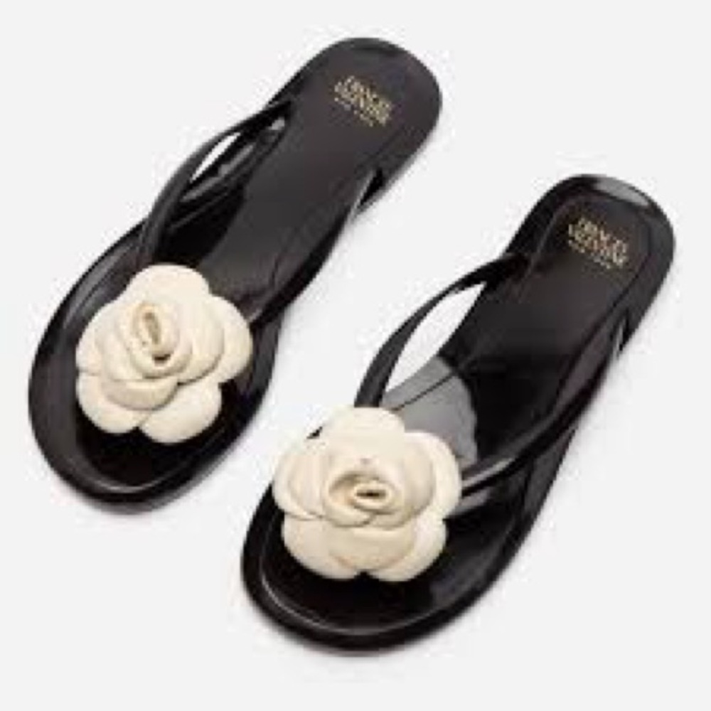 Frances Valentine Black Flip Flop Sandals with Cream Floral Accent